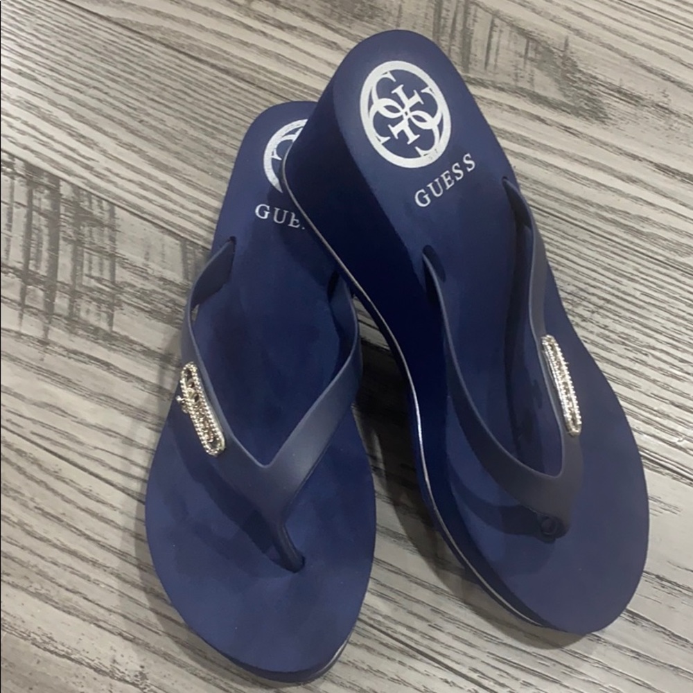 Guess wedge flip flops